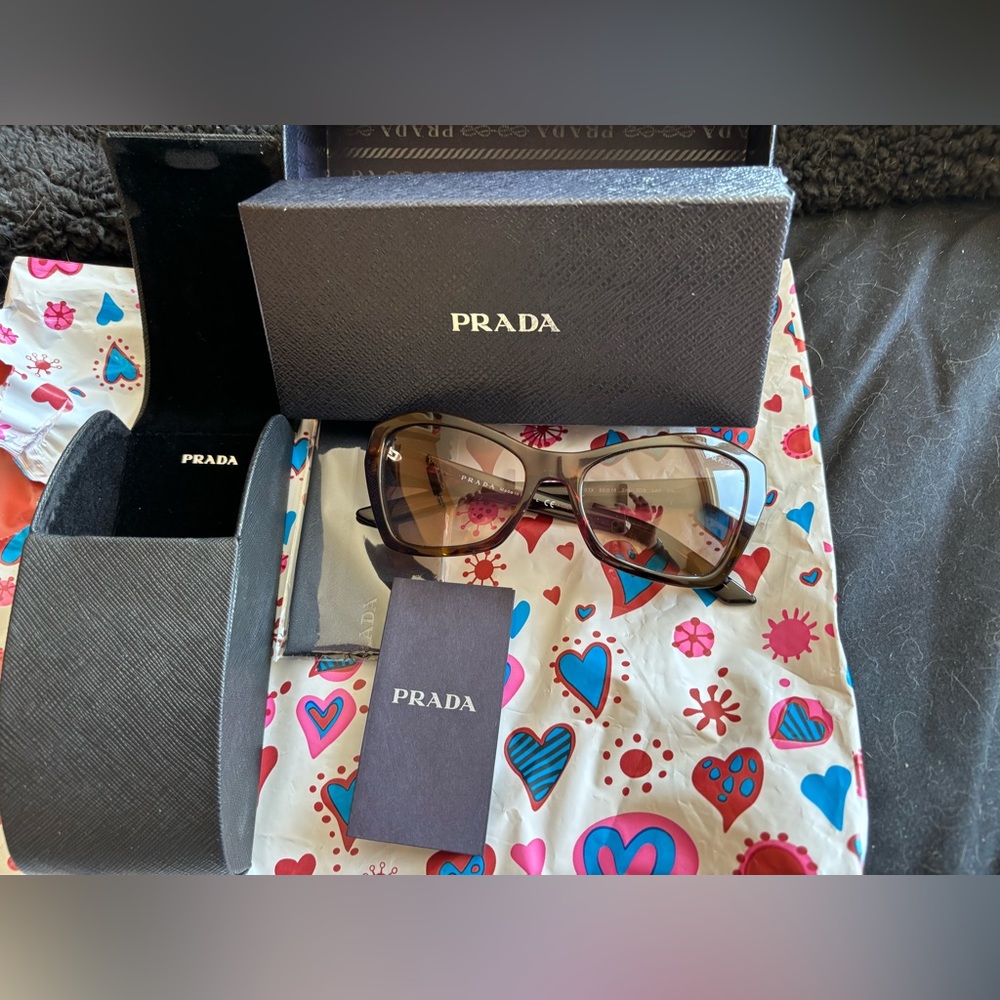 GENTLY USED PRADA SUNGLASSES W/case,cloth,authen.